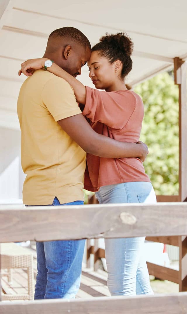 man woman hugging