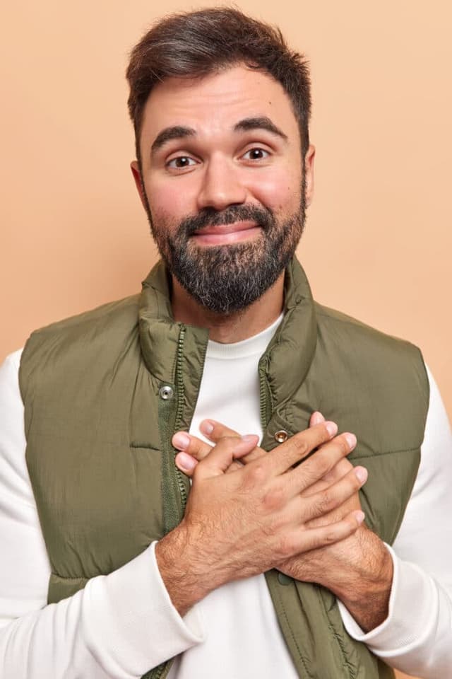 man holding his heart